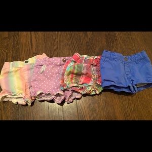 4 pairs of baby girl shorts- 12 months